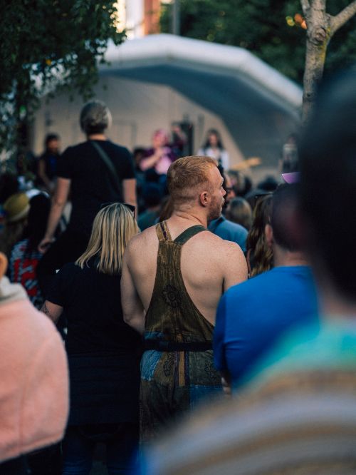 Free A diverse crowd enjoying an outdoor music festival during the day. Stock Photo