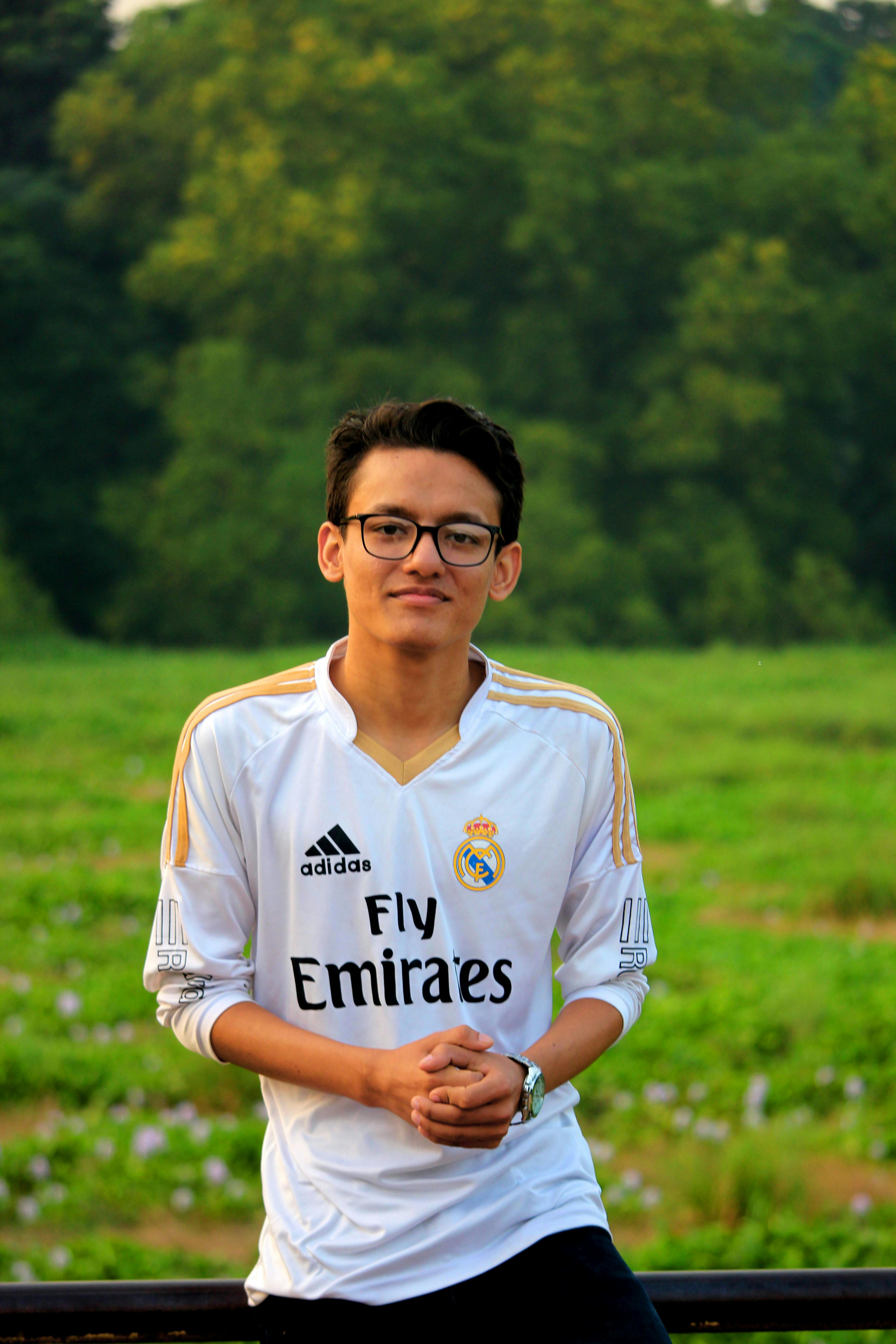 Maasai beekeeper preparing hive inspection
