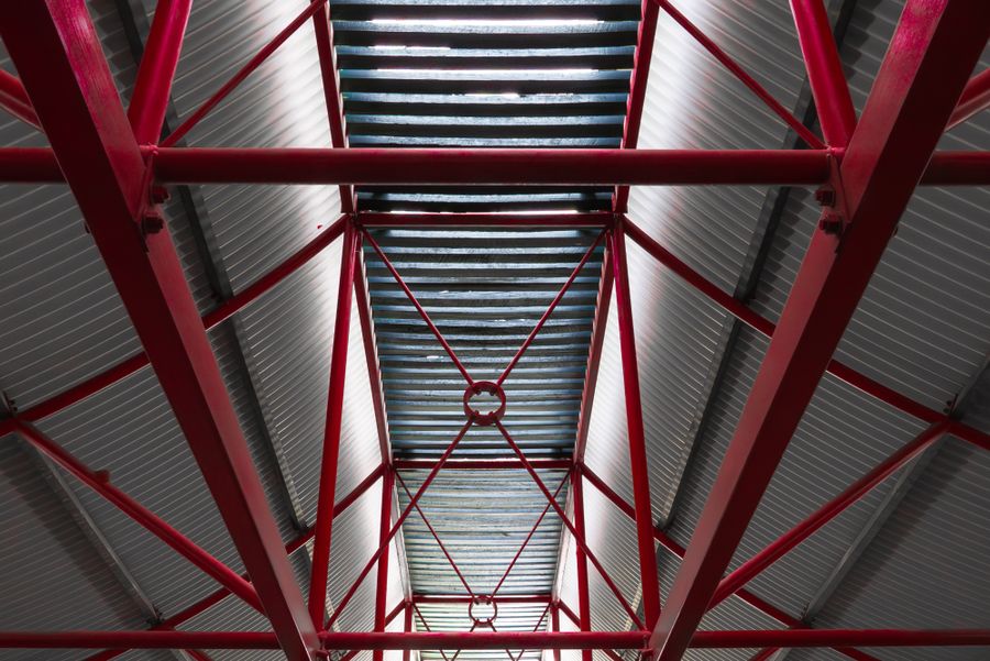 steel beams and an industrial roof structure seen from below