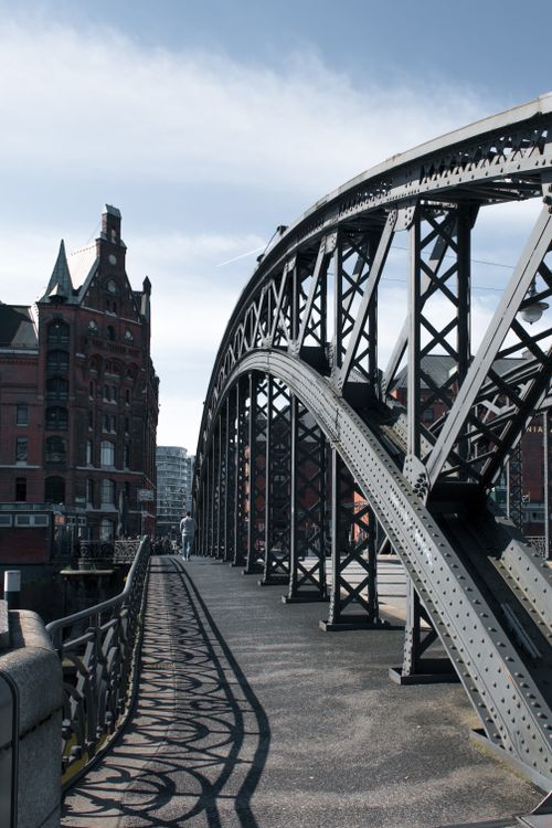 Free A scenic view of a historic steel bridge in Hamburg, showcasing urban architecture. Stock Photo