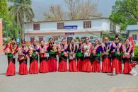 Group of Nepali women in vibrant traditional attire performing a cultural ceremony in Butwal.