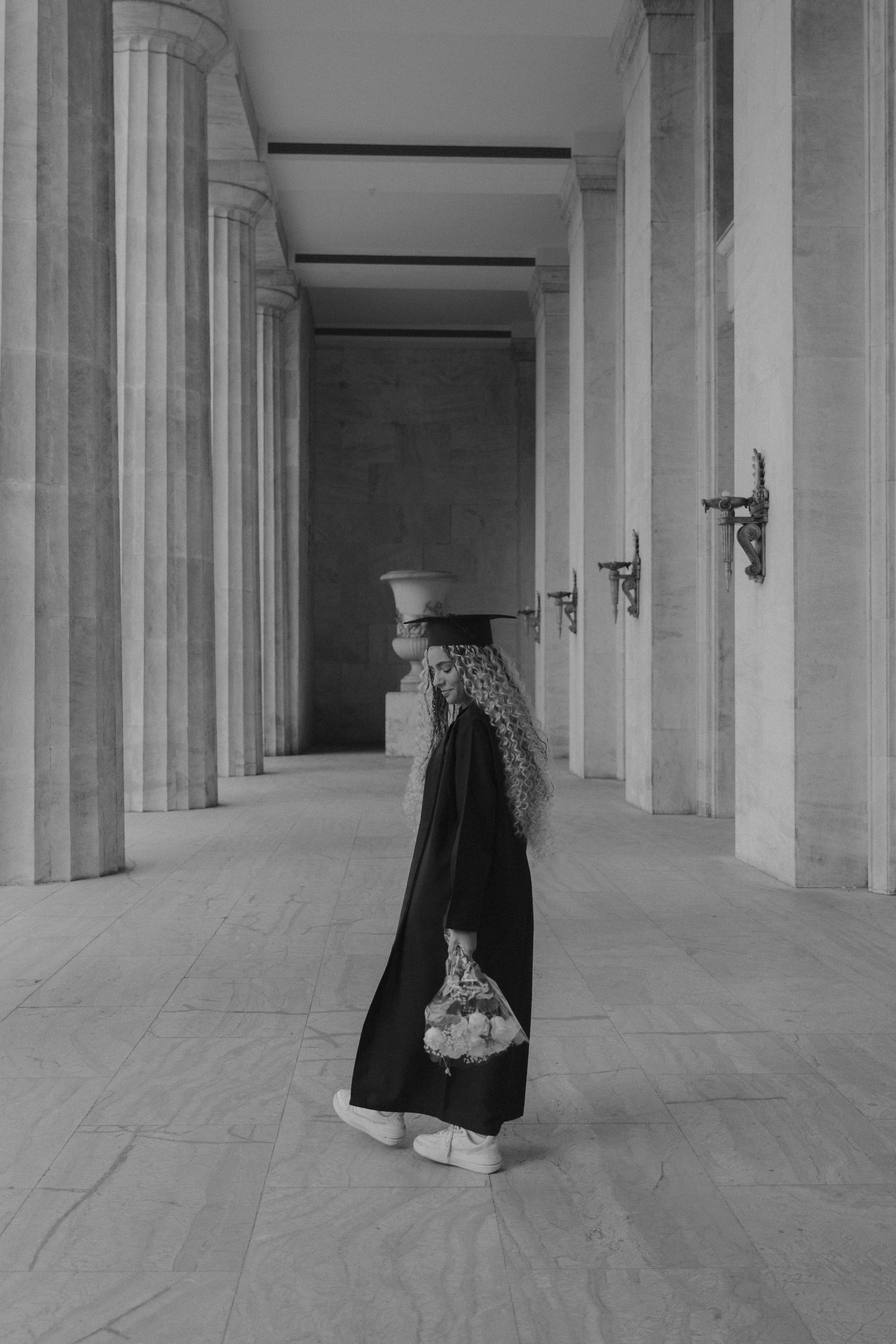 Woman in Gown and Academic Hat in Black and White · Free Stock Photo
