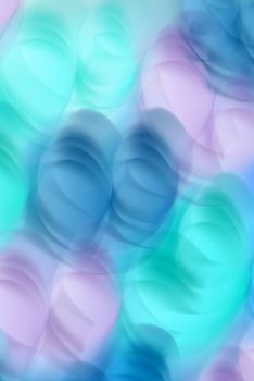Soft blurred abstract shapes in pastel blues and purples creating a calming pattern.