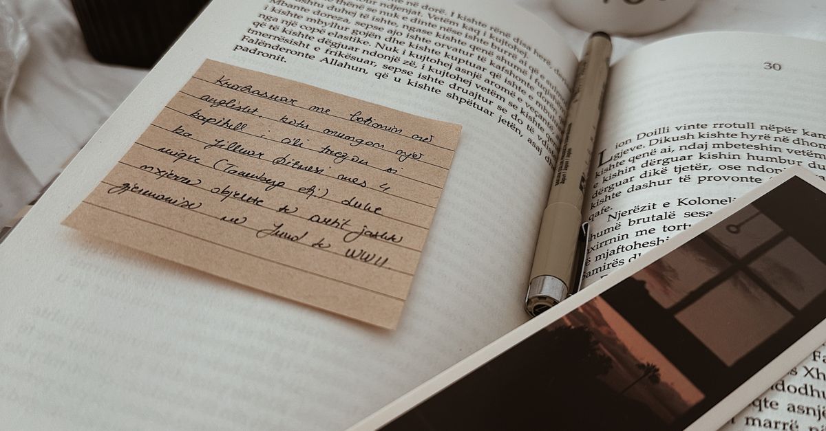 Notes on Page of Open Book · Free Stock Photo