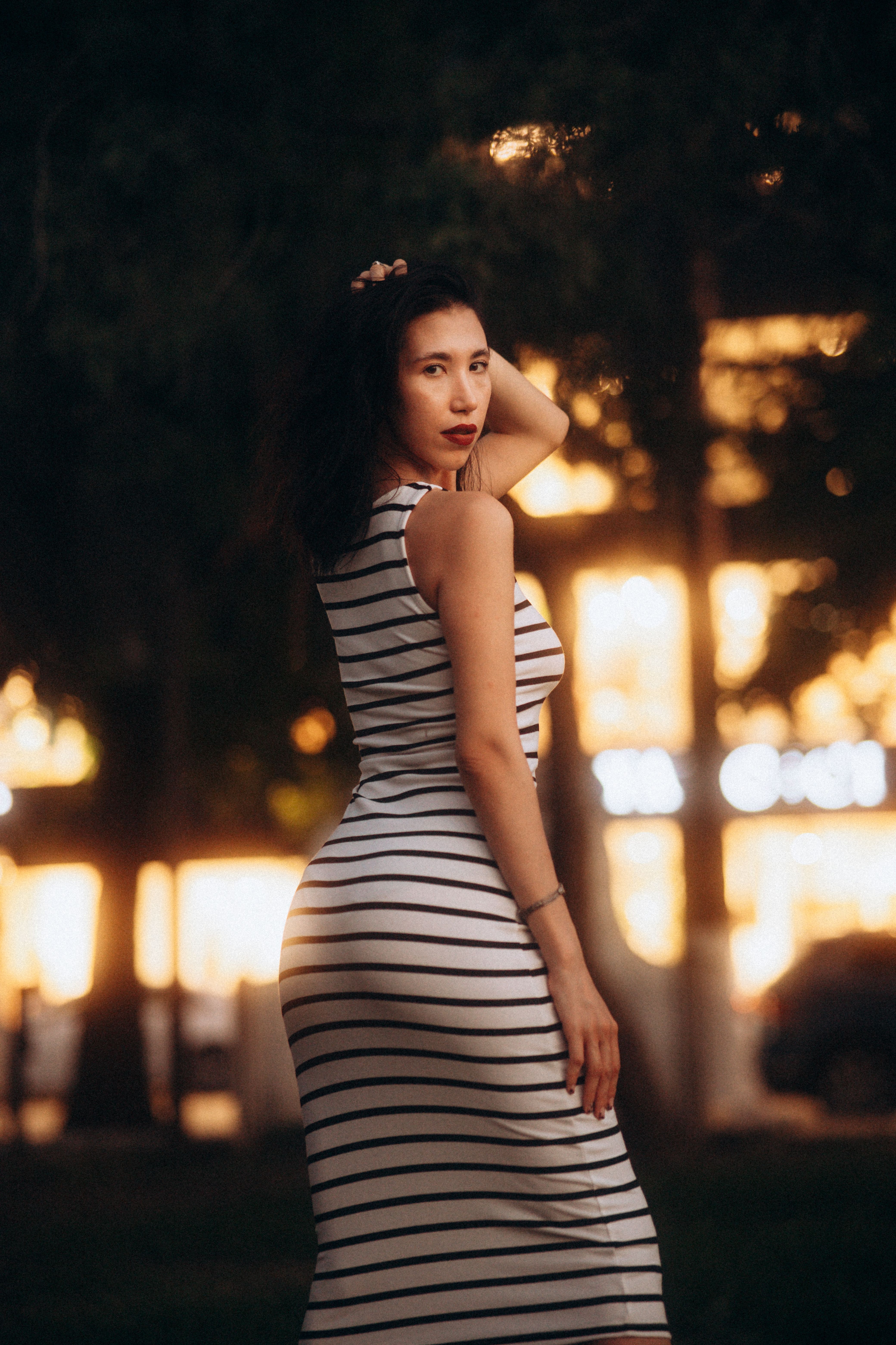Portrait of Woman in Striped Dress · Free Stock Photo