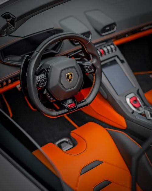 Free Explore the sleek and luxurious interior of a Lamborghini Huracan, showcasing premium design elements. Stock Photo