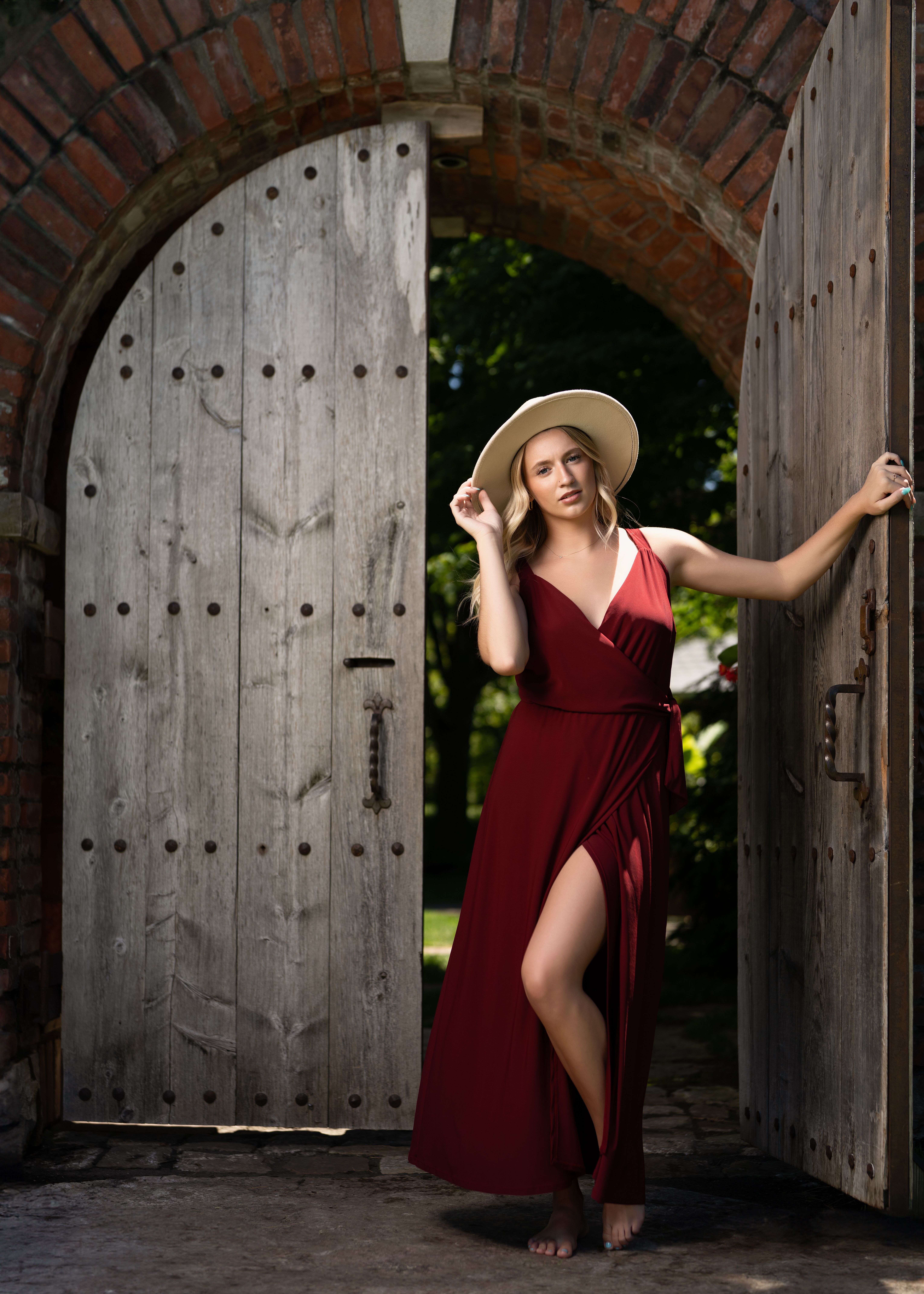 Woman Wearing Red Dress in Front of Wooden Gate · Free Stock Photo