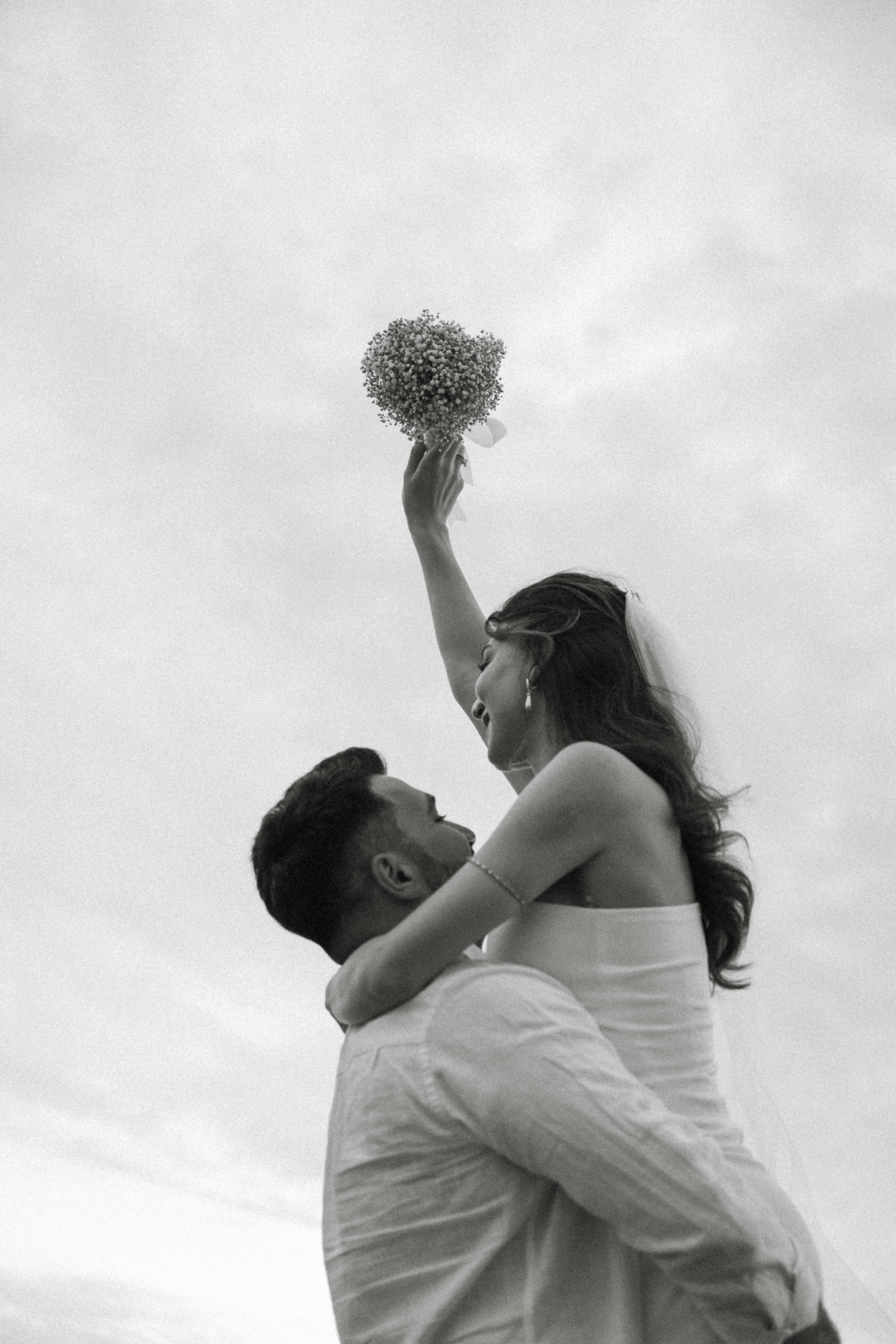 groom lifting the bride