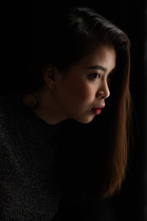 Free Portrait Of A Woman In Side View Stock Photo