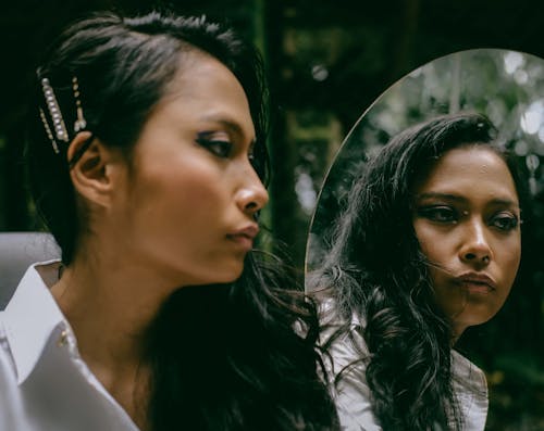 Photo Of Woman In Front Of Mirror