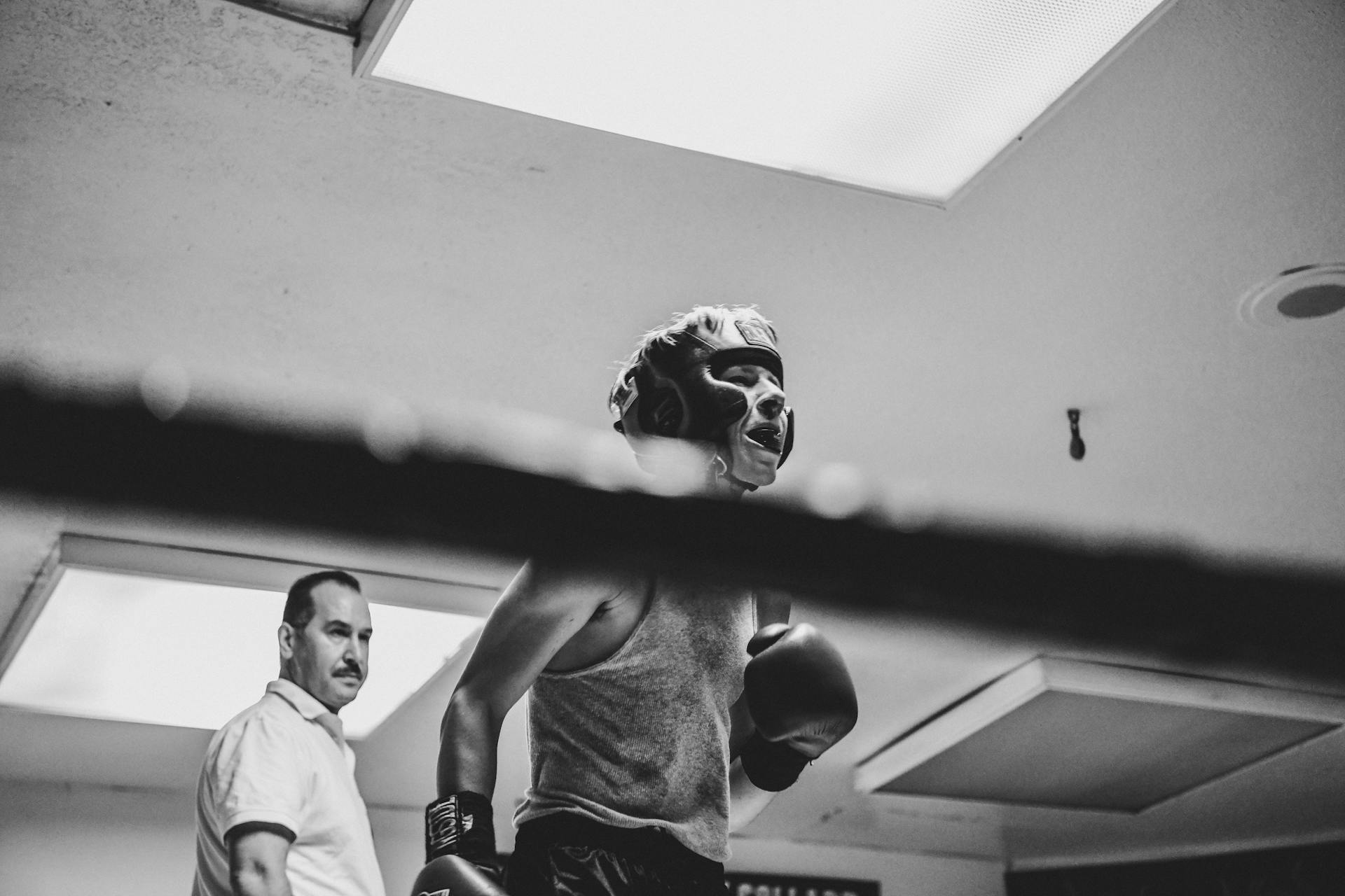 Trainer and Boxer in Boxing Ring