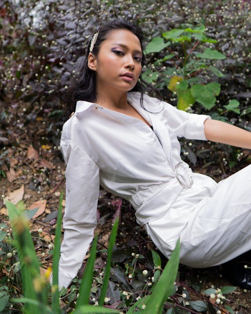 Photo of Woman Wearing White Jumpsuit