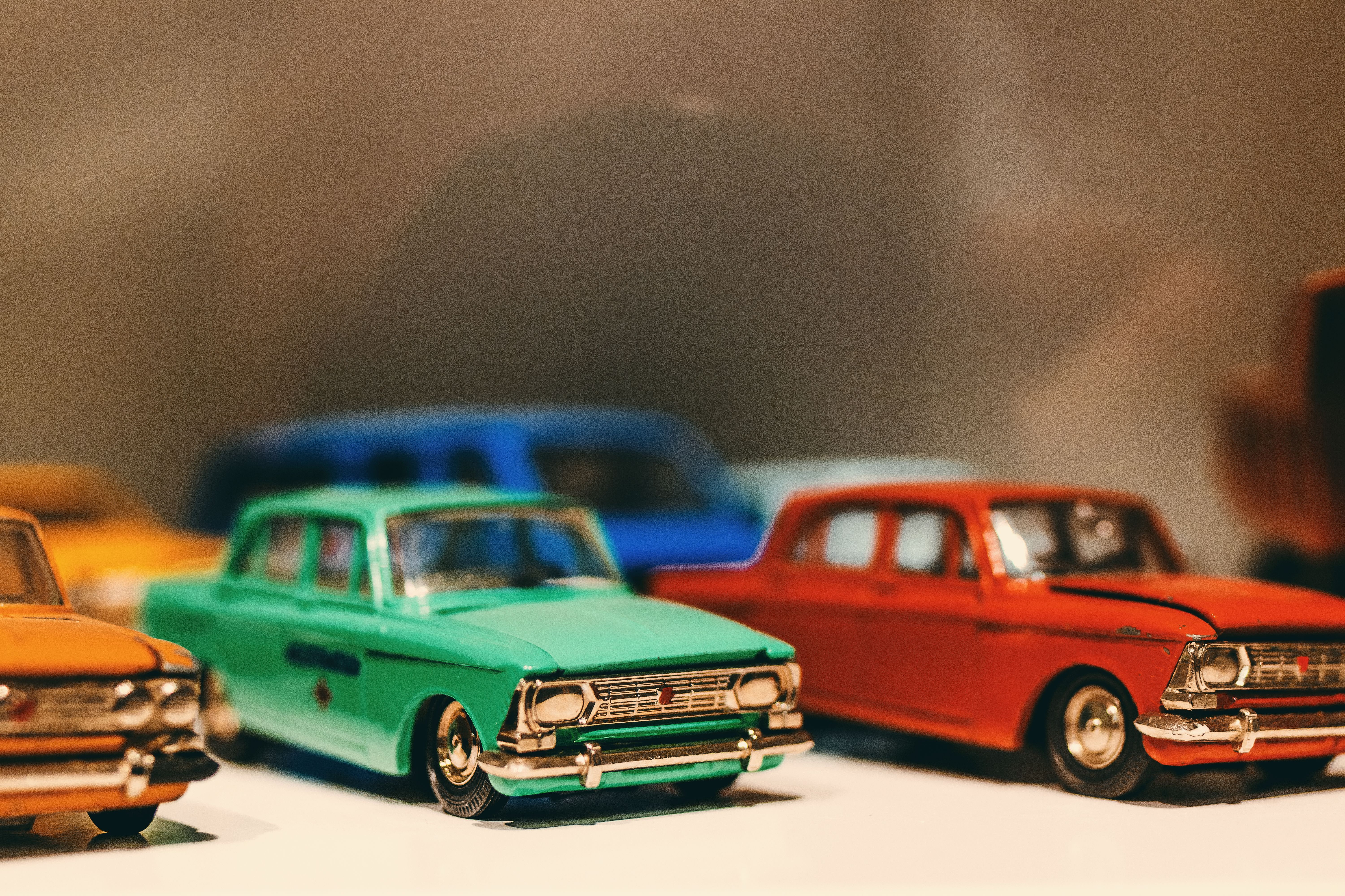 Selective Focus Photography of Classic Car Die Cast Models