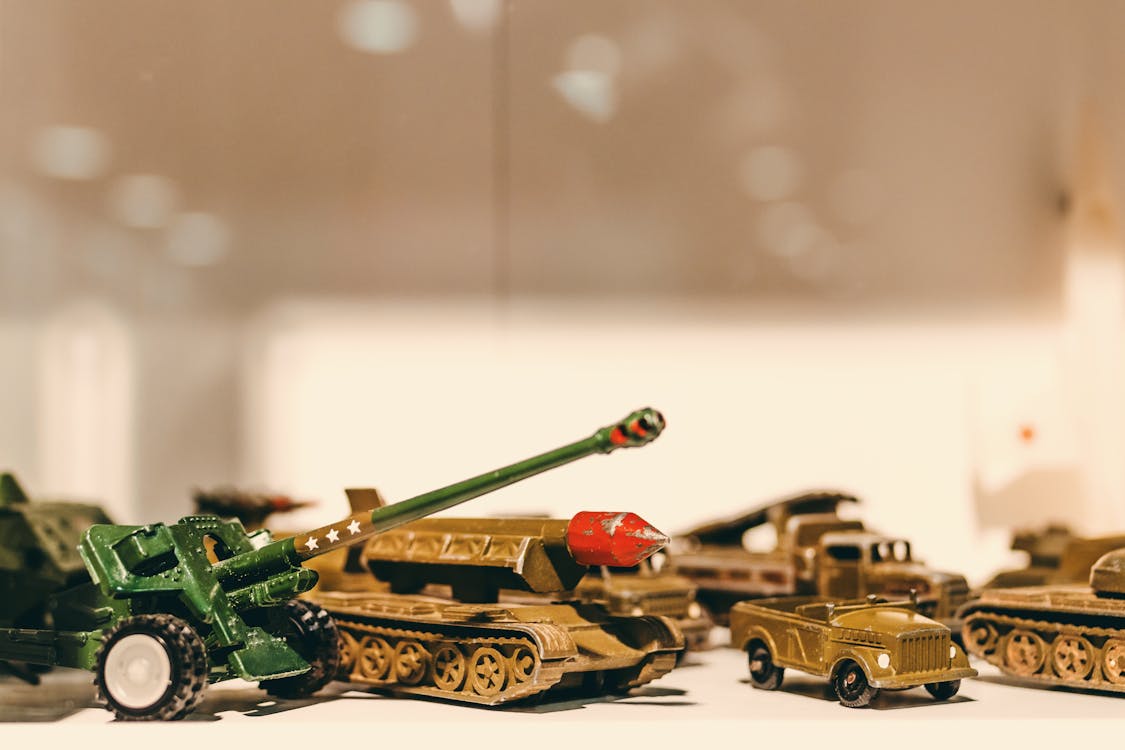 Free Selective Focus Photography of Die Cast Model Combat Vehicles Stock Photo