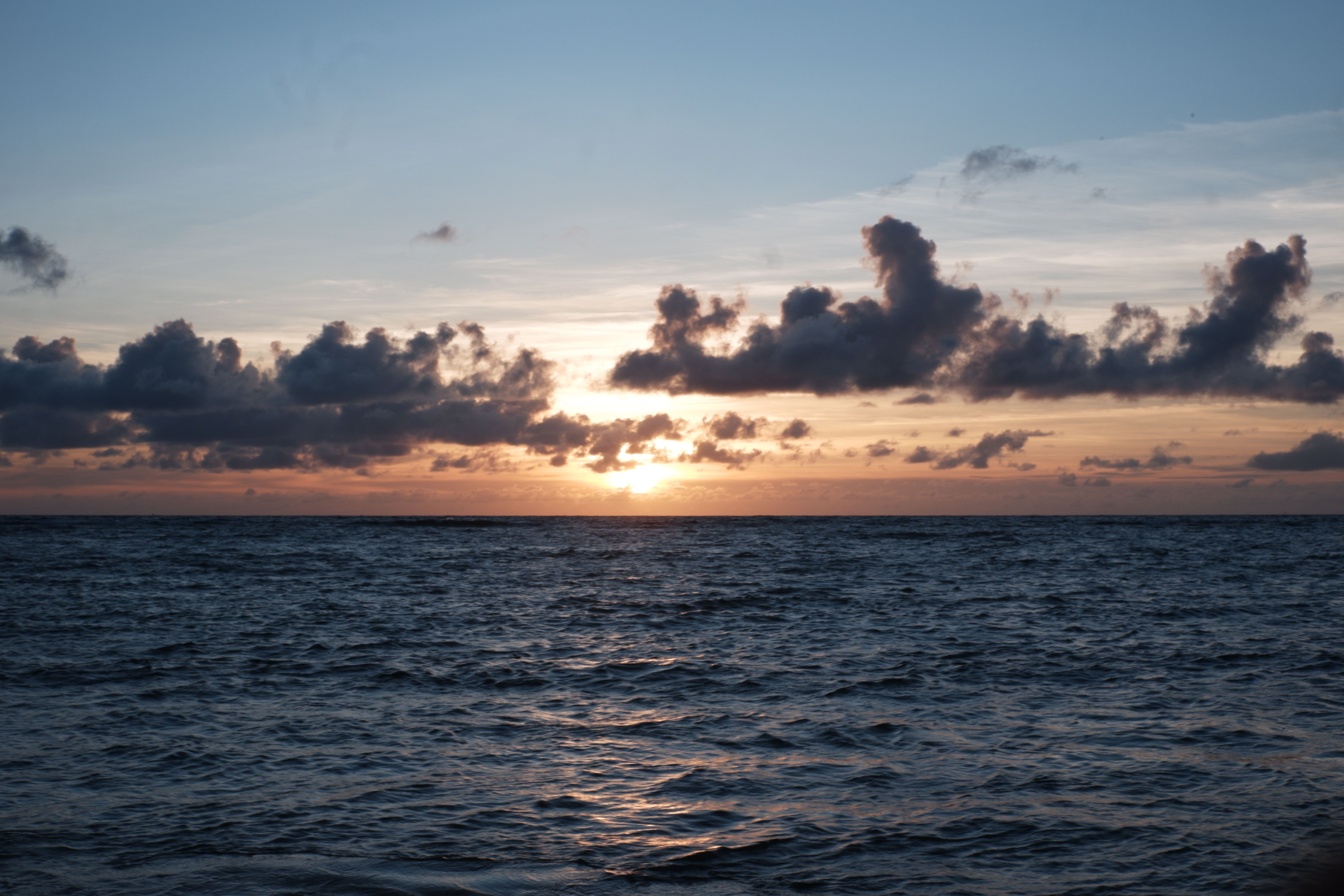 Clouds over Sea at Sunset · Free Stock Photo