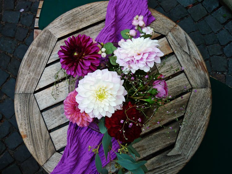 White, Pink, And Purple Flowers On Table