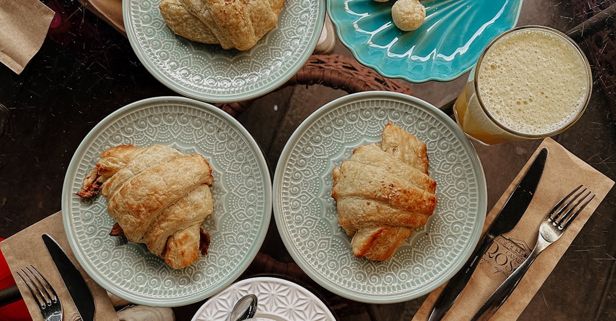 Croissants on Plates in Cafe