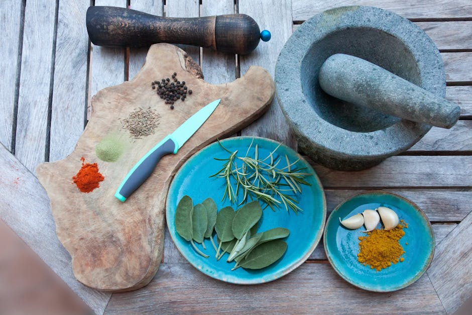 mortar and pestle with various spices for chicken - Best spice for chicken
