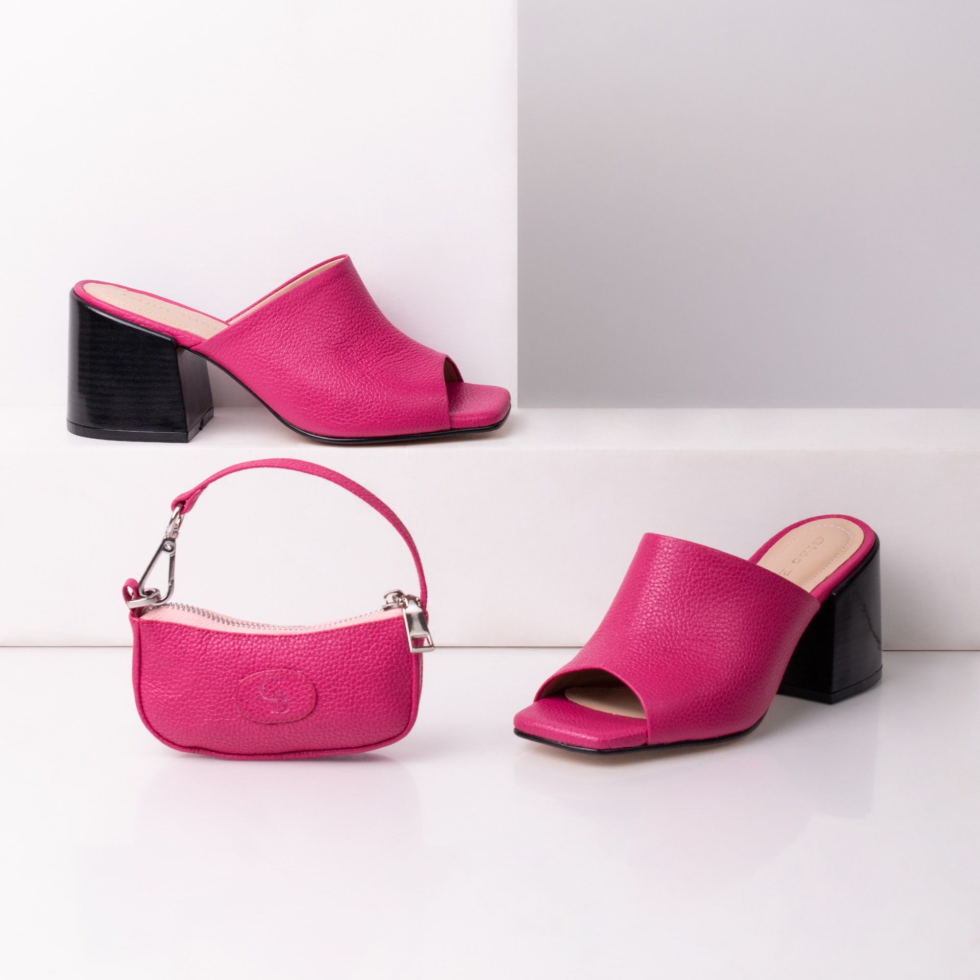 Pink Shoes and Bag in a Studio · Free Stock Photo