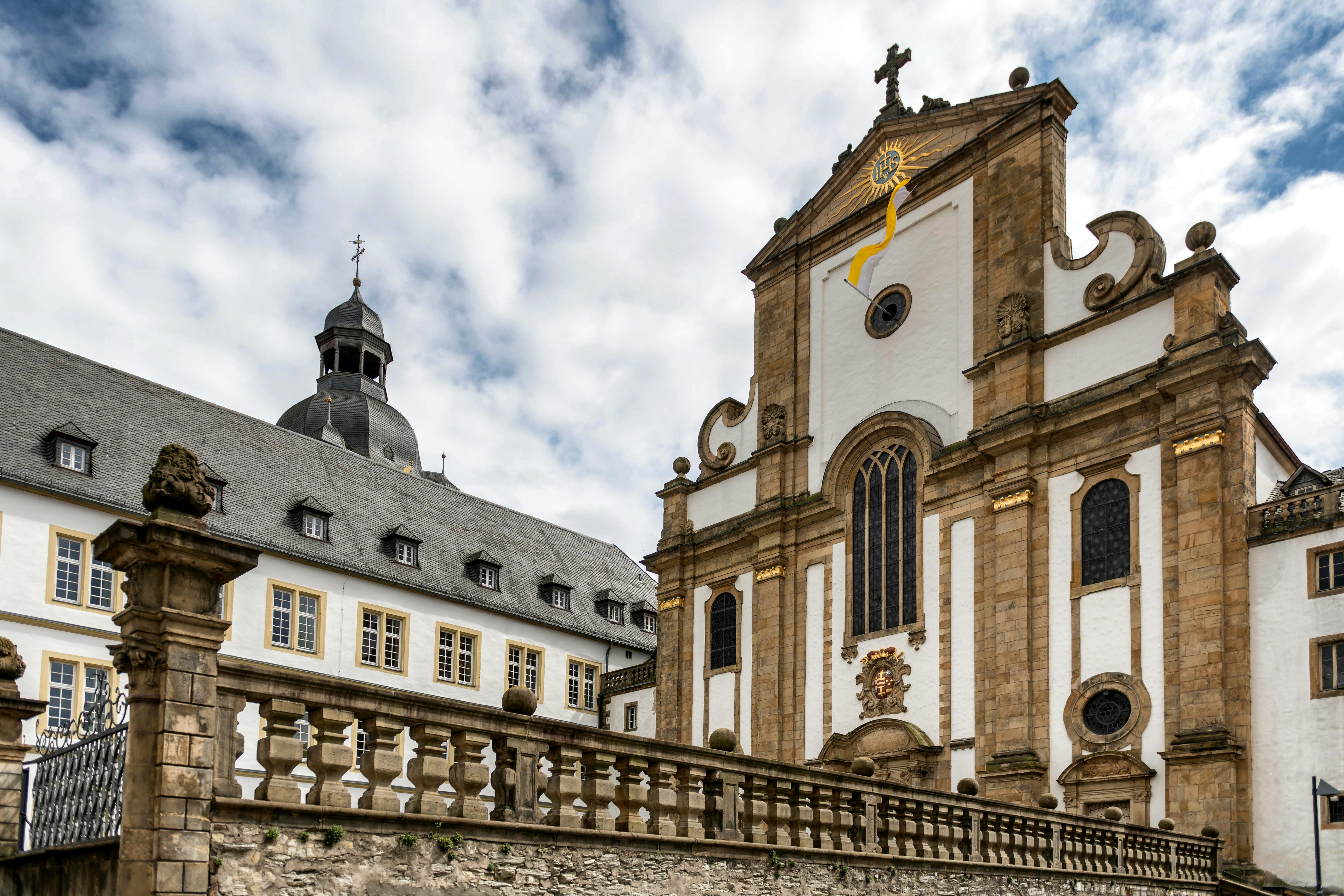 A detailed view of the historic church facade in Paderborn, showcasing classic architecture.