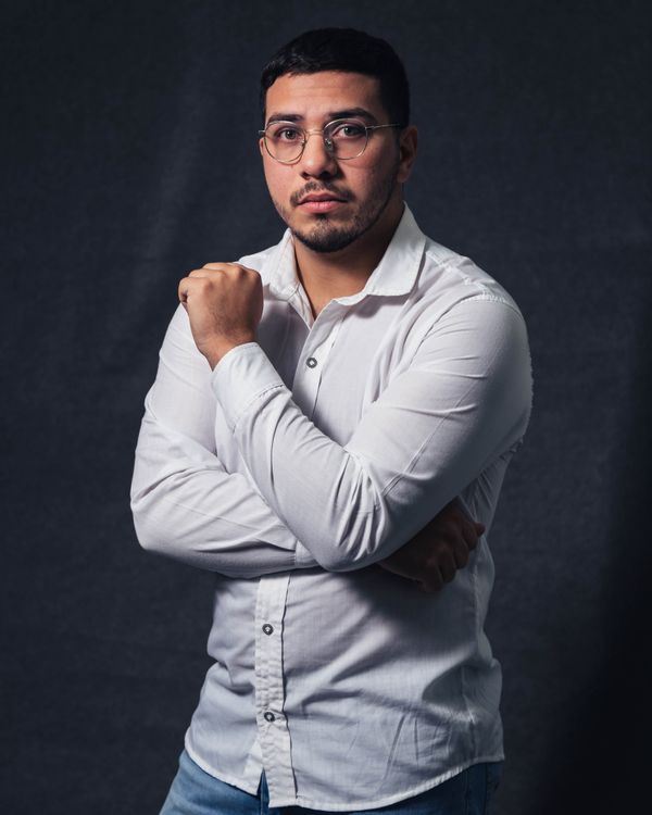 Portrait of Man in White Shirt · Free Stock Photo