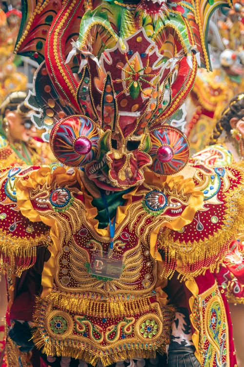 Free Detailed view of a colorful carnival costume from the famous Oruro Festival in Bolivia, showcasing traditional cultural elements. Stock Photo