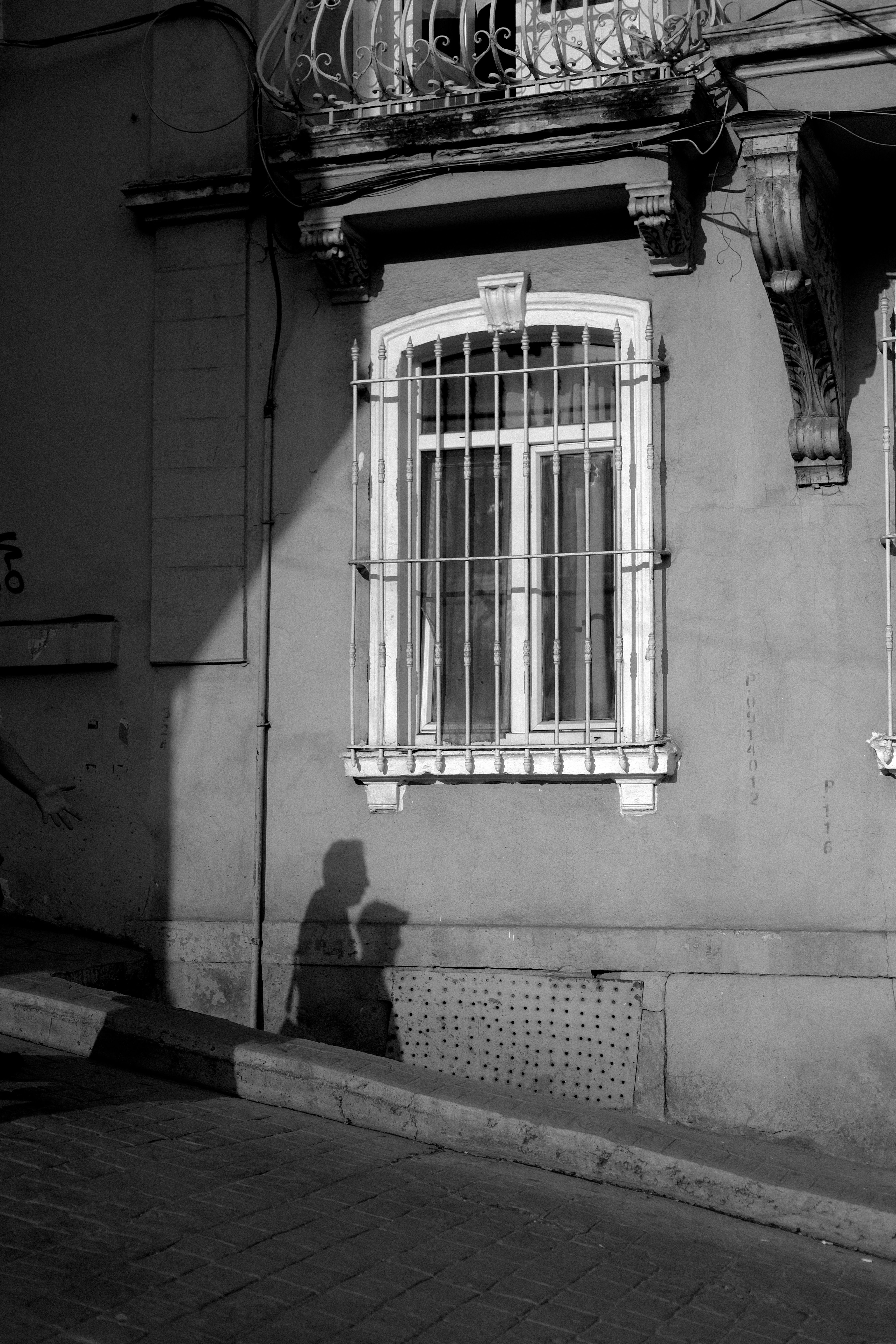 Person Shadow on Building Wall · Free Stock Photo
