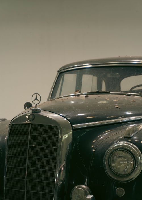 Free Elegant close-up of a vintage Mercedes-Benz showing classic design. Stock Photo