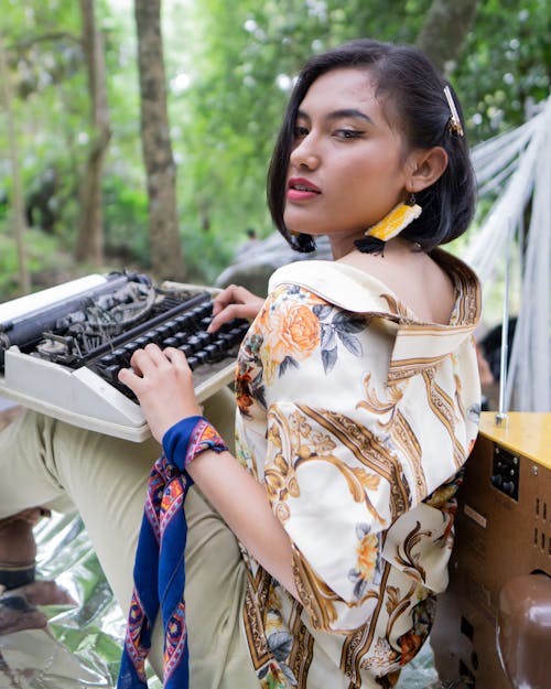 Free Photo Of Woman Holding Using Typewriter Stock Photo