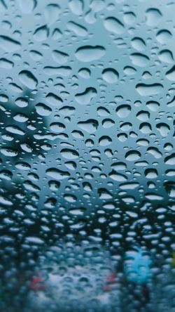 Rain beading on cold glass — photo by Jagan Ram on Pexels