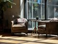 Sunlit living room with armchairs and plants, photo by Tom Schönmann on Pexels