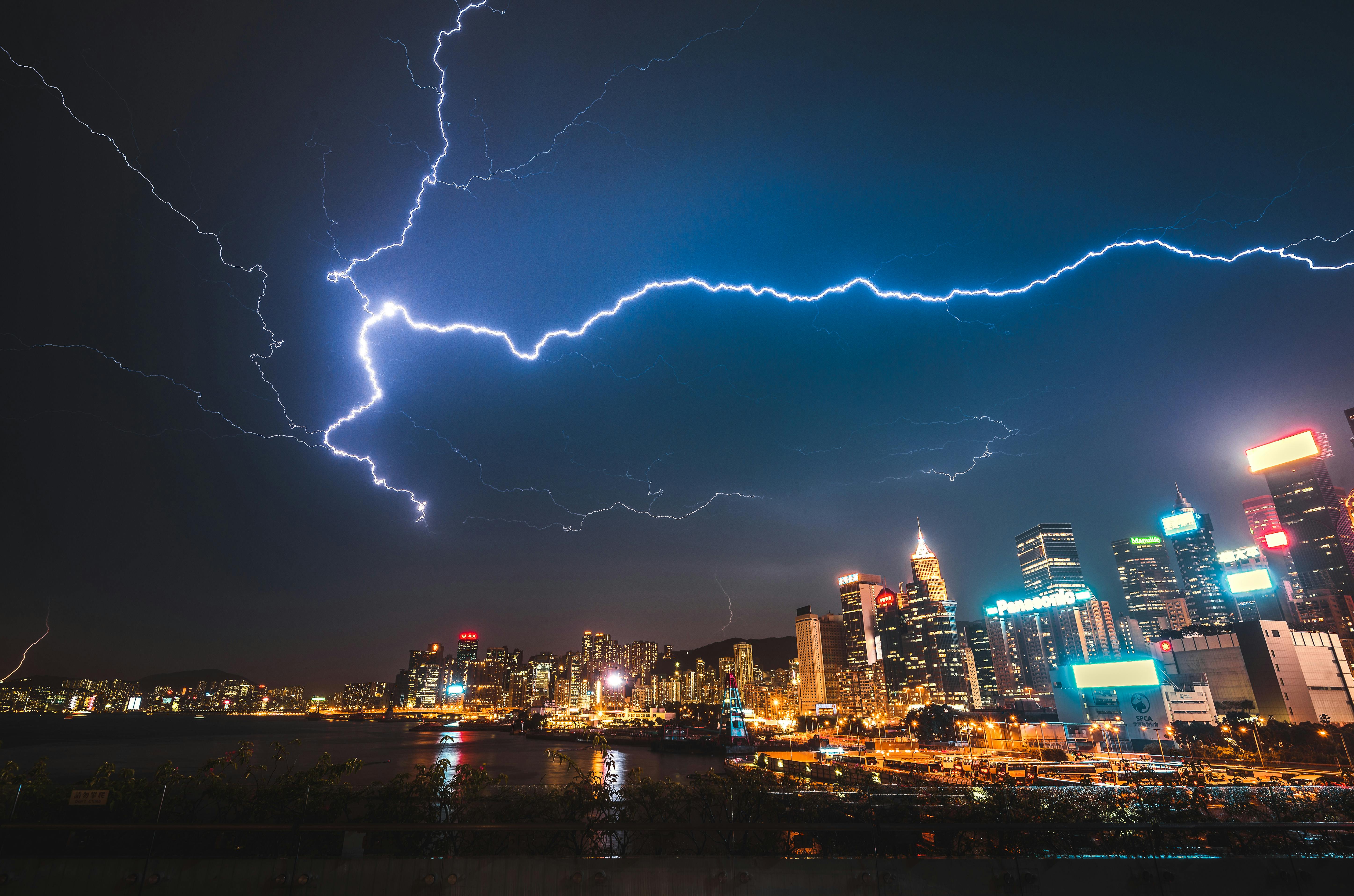 Photo Of City Buildings Under Lightning Strike Free Stock Photo