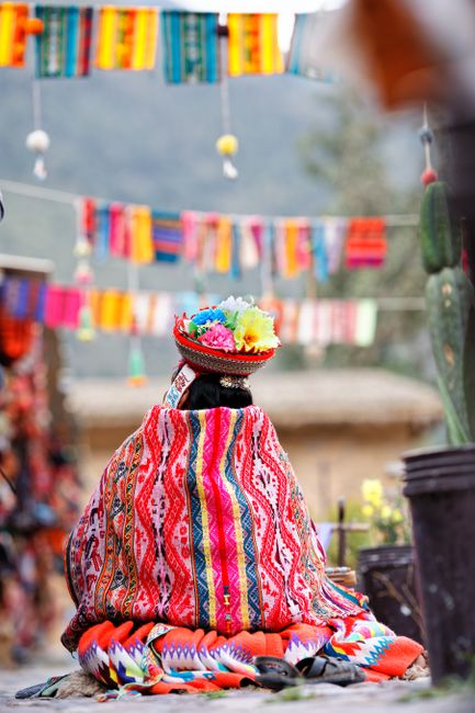 Colorful Peruvian traditional attire displayed at a market in Cusco, Peru, showcasing cultural richness.
