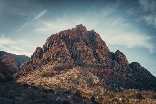 Free Stunning view of Red Rock Canyon's rocky terrain under a blue sky in Nevada, USA. Stock Photo