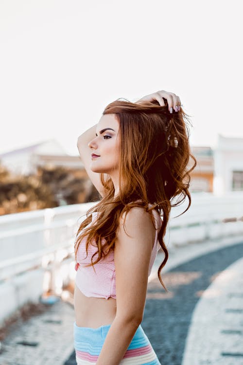 Photo of Woman Wearing Pink Top