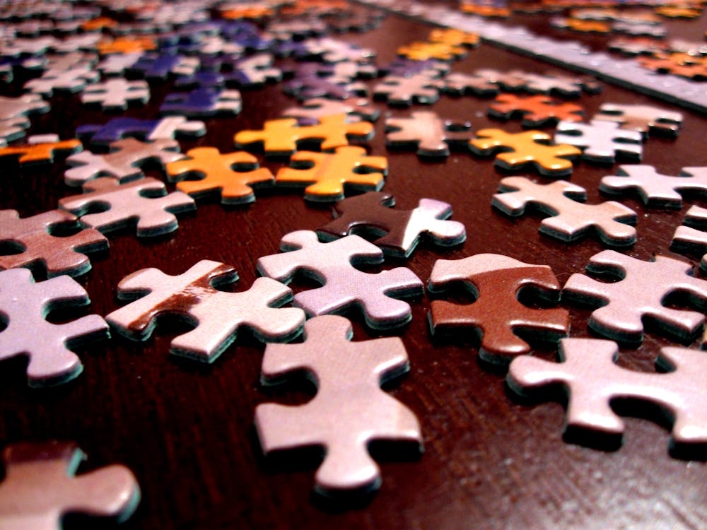Selective Focus Photography of Assorted-color Puzzle Pieces