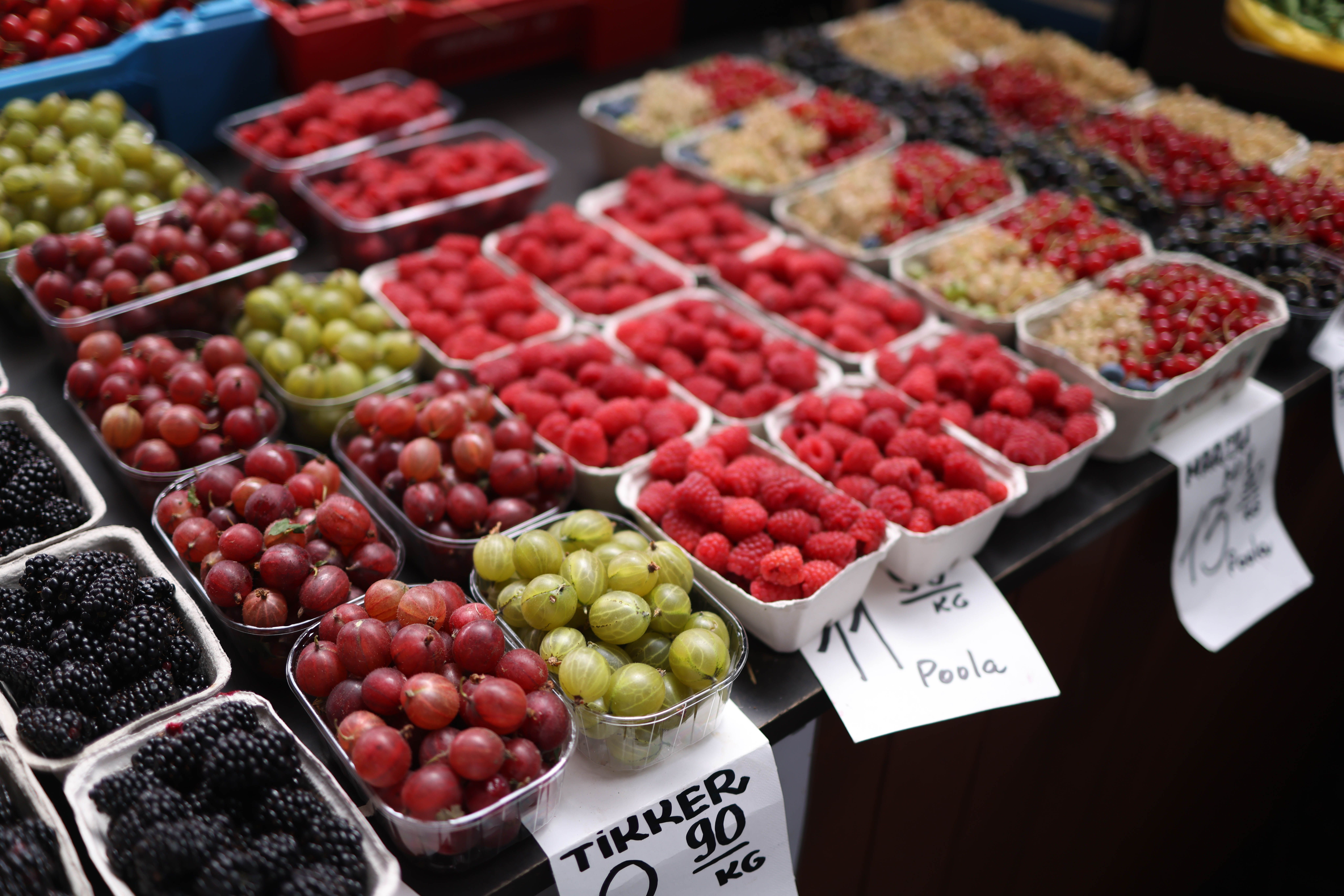 Fruit, edible; raspberries, blackberries, mulberries, loganberries, black, white or red currants and gooseberries, uncooked or cooked, whether or not containing added sugar or other sweetening matter