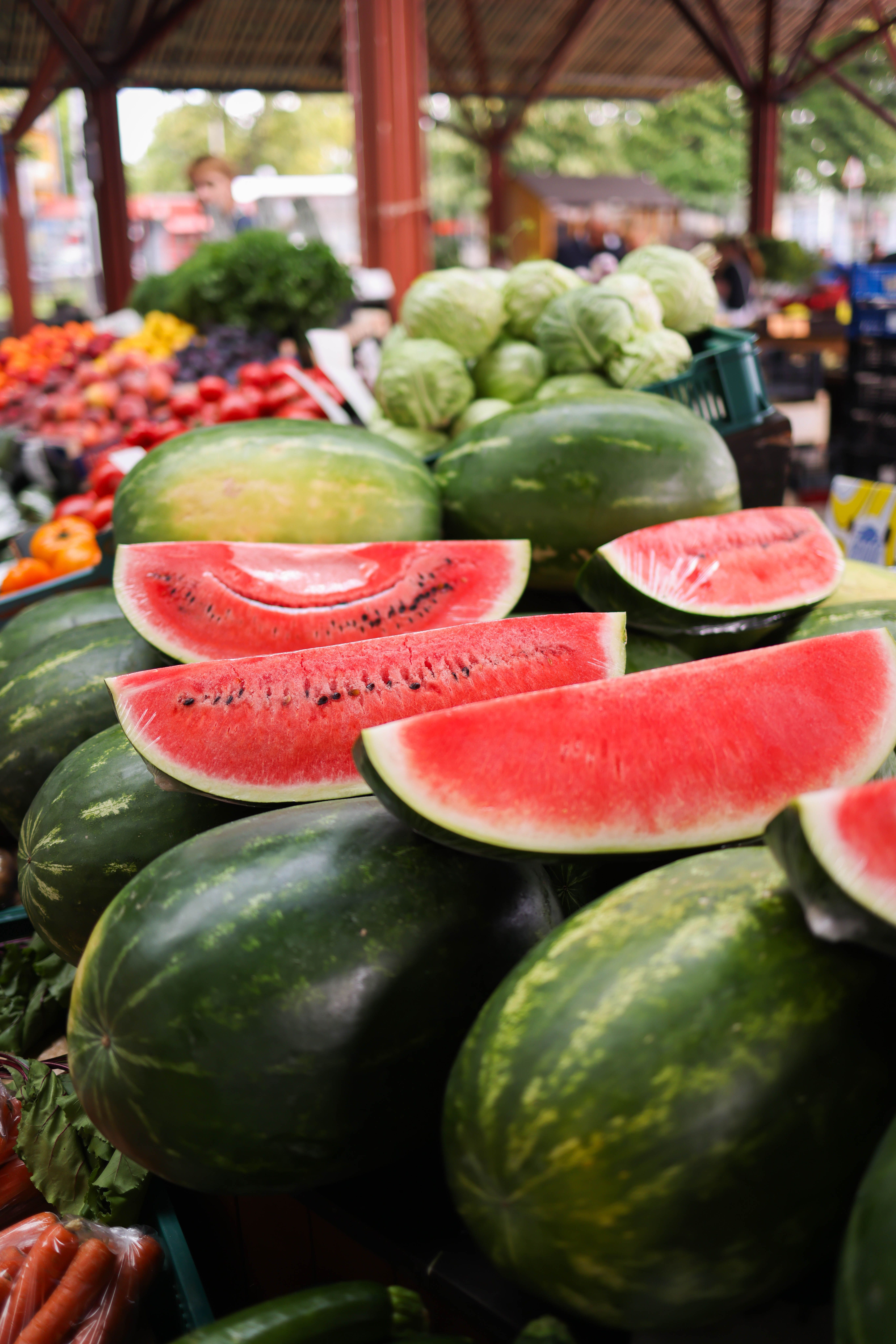 Stacked Watermelons in a Market · Free Stock Photo