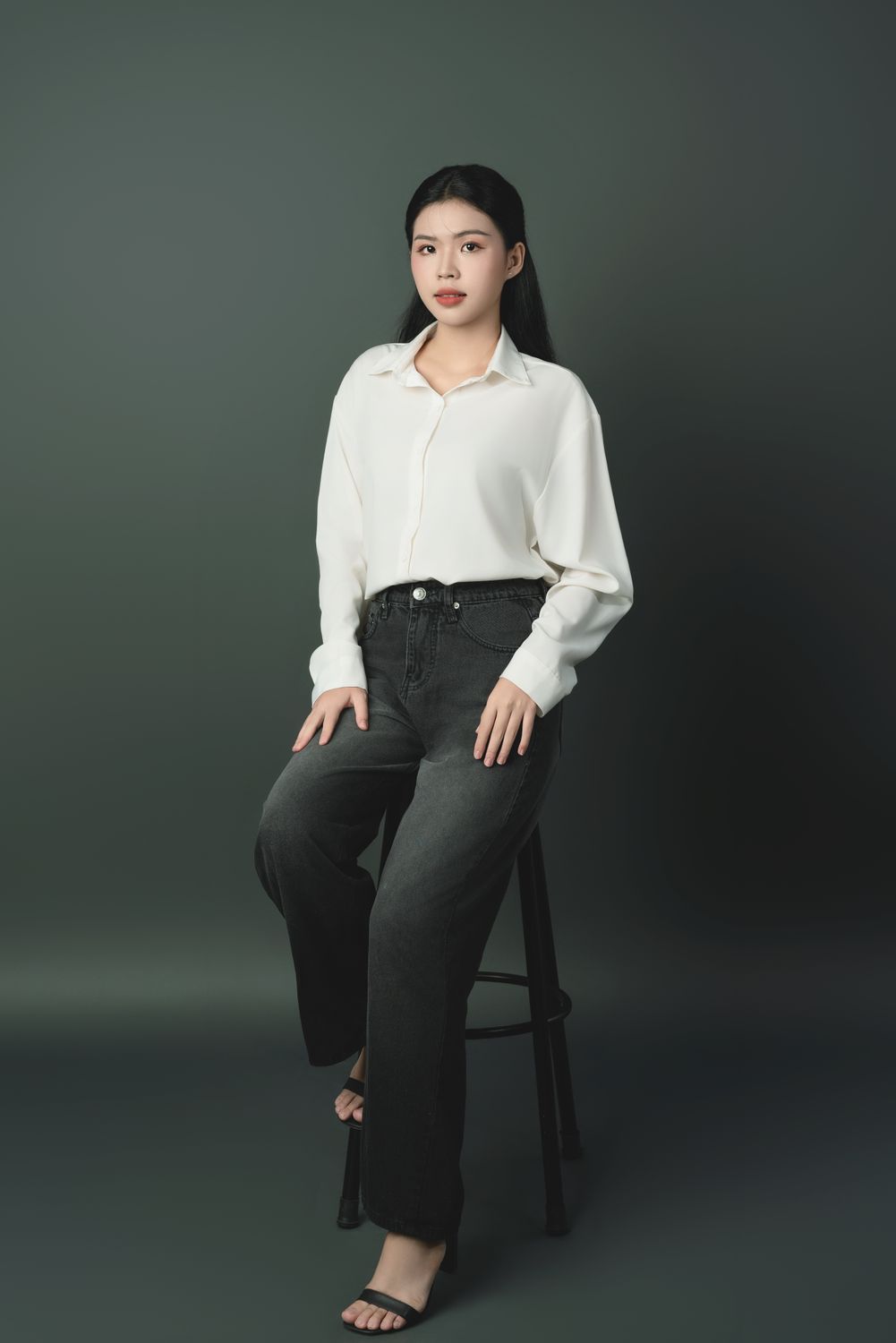 Portrait of a Woman Sitting on a Chair · Free Stock Photo