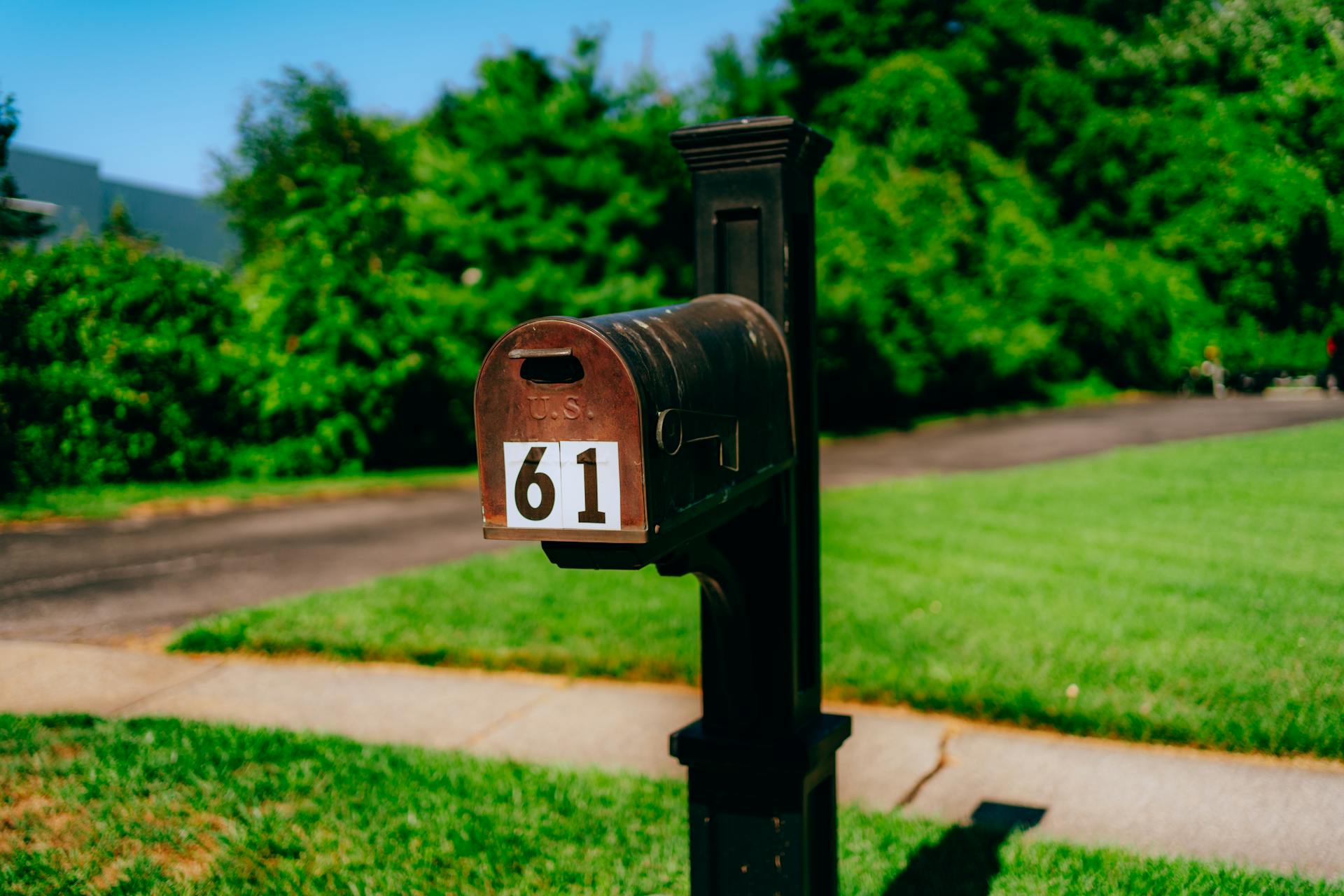 Rusty Mailbox on Pole