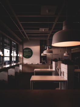Chic industrial cafe with minimalist design in Berlin. Ideal for contemporary interior design concepts.