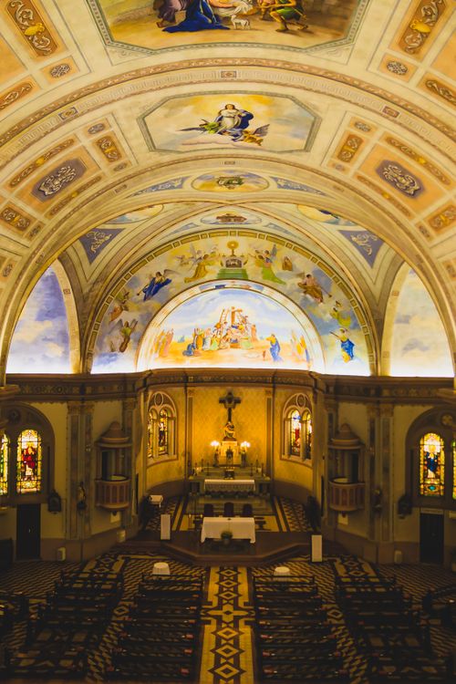 Free Explore the stunning frescoed ceilings of a Brazilian church. Perfect for religious and architectural inspiration. Stock Photo