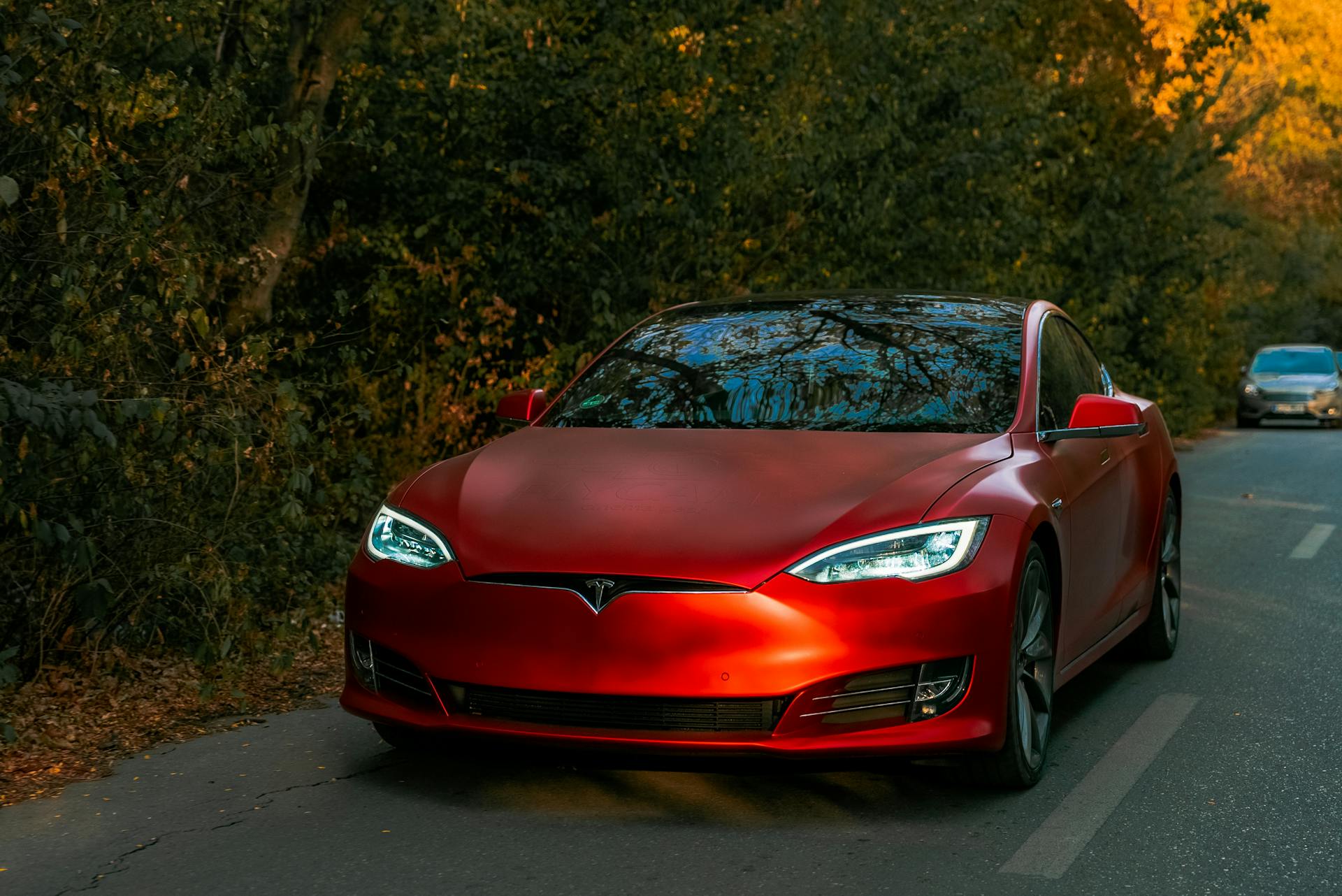 Front View of a Red Tesla