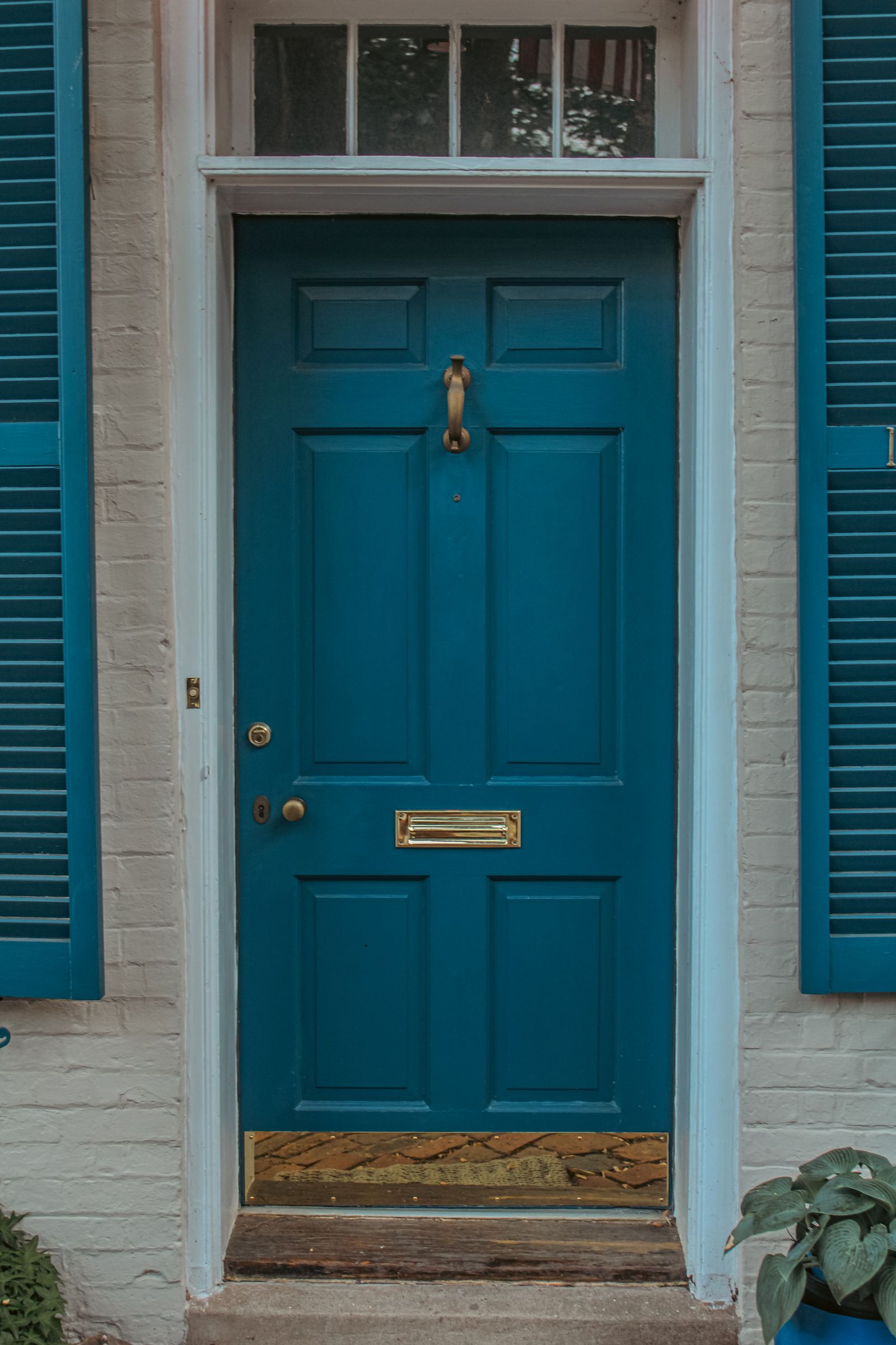 Painted front door and exterior architectural details