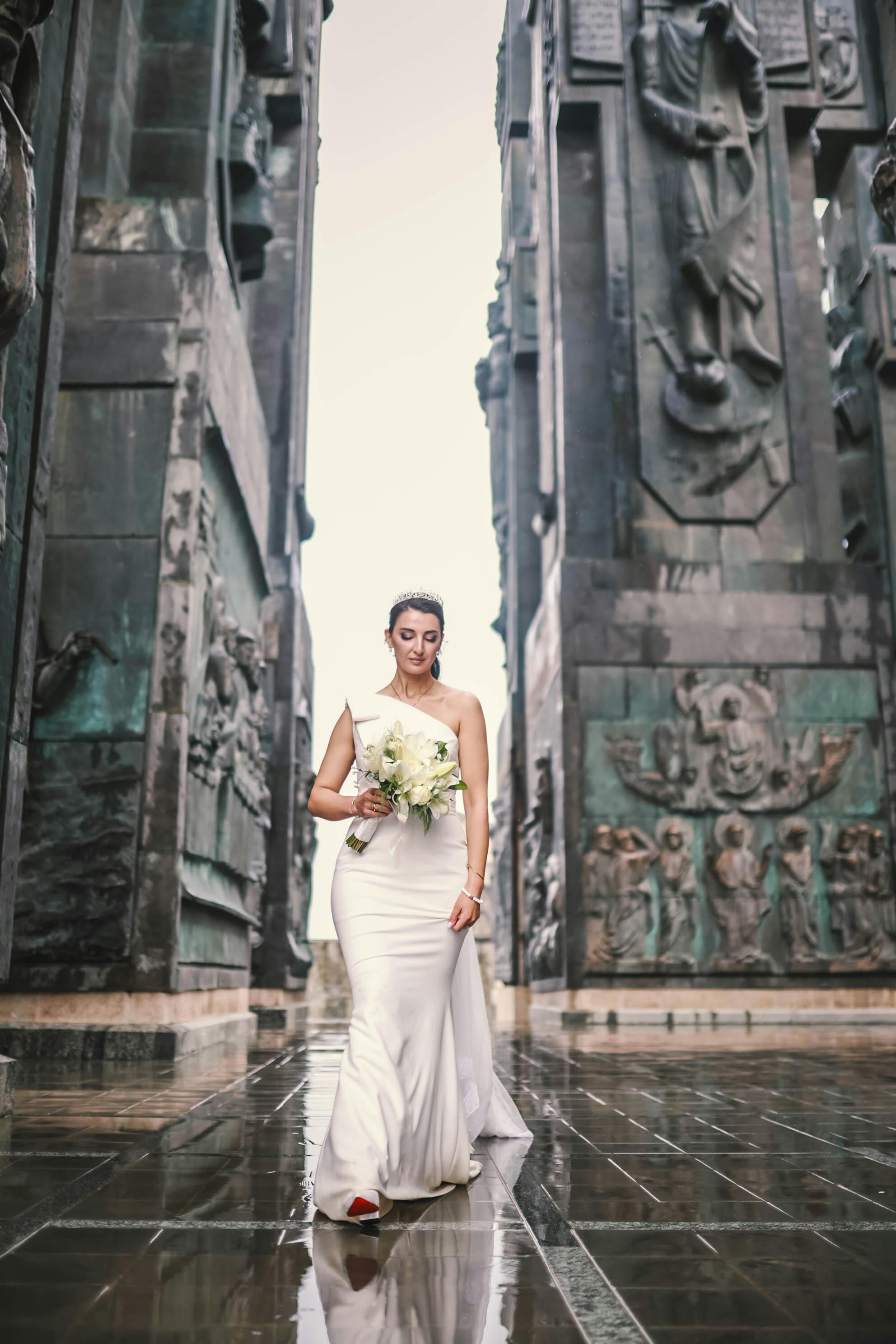 bride walking in wedding dress