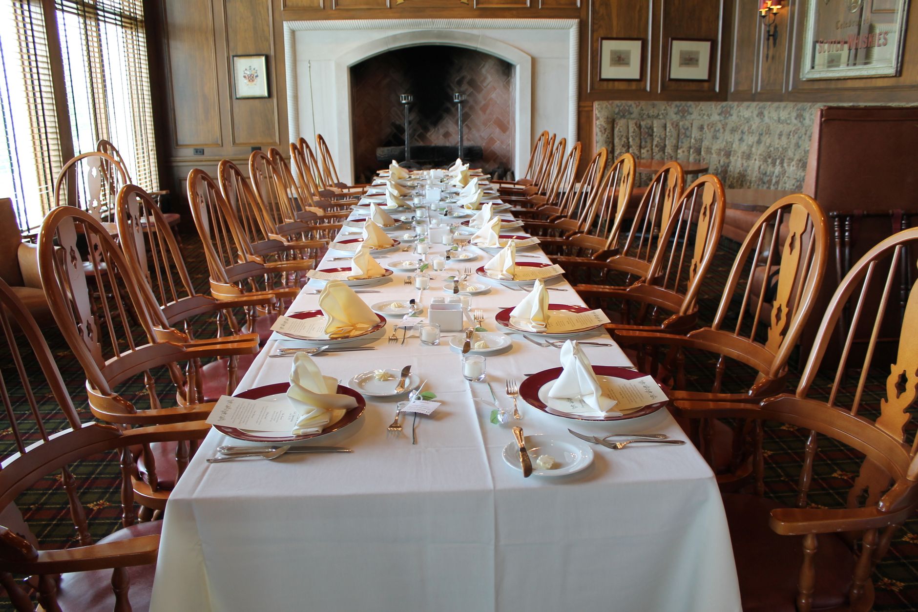 Formal dining table set in a classic rustic room, perfect for special gatherings.