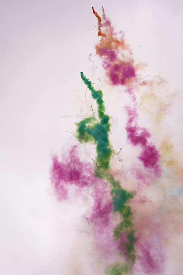 Colorful smoke forming abstract shapes — photo by Diego Girón on Pexels
