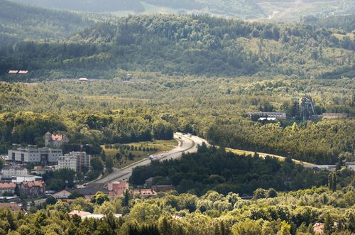 Free Stunning aerial view of Wałbrzych, capturing lush green landscapes and town buildings in summer. Stock Photo