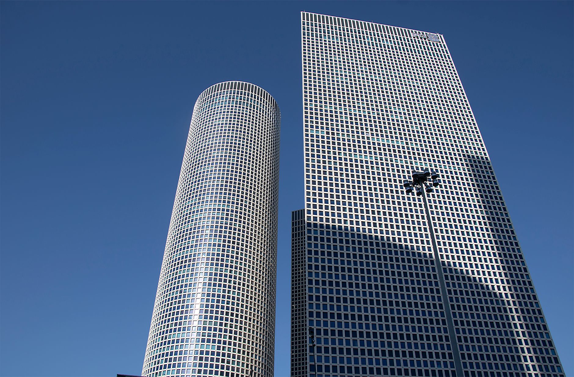 Tel Aviv office towers, illustrating the capital-markets backdrop for Israeli lenders