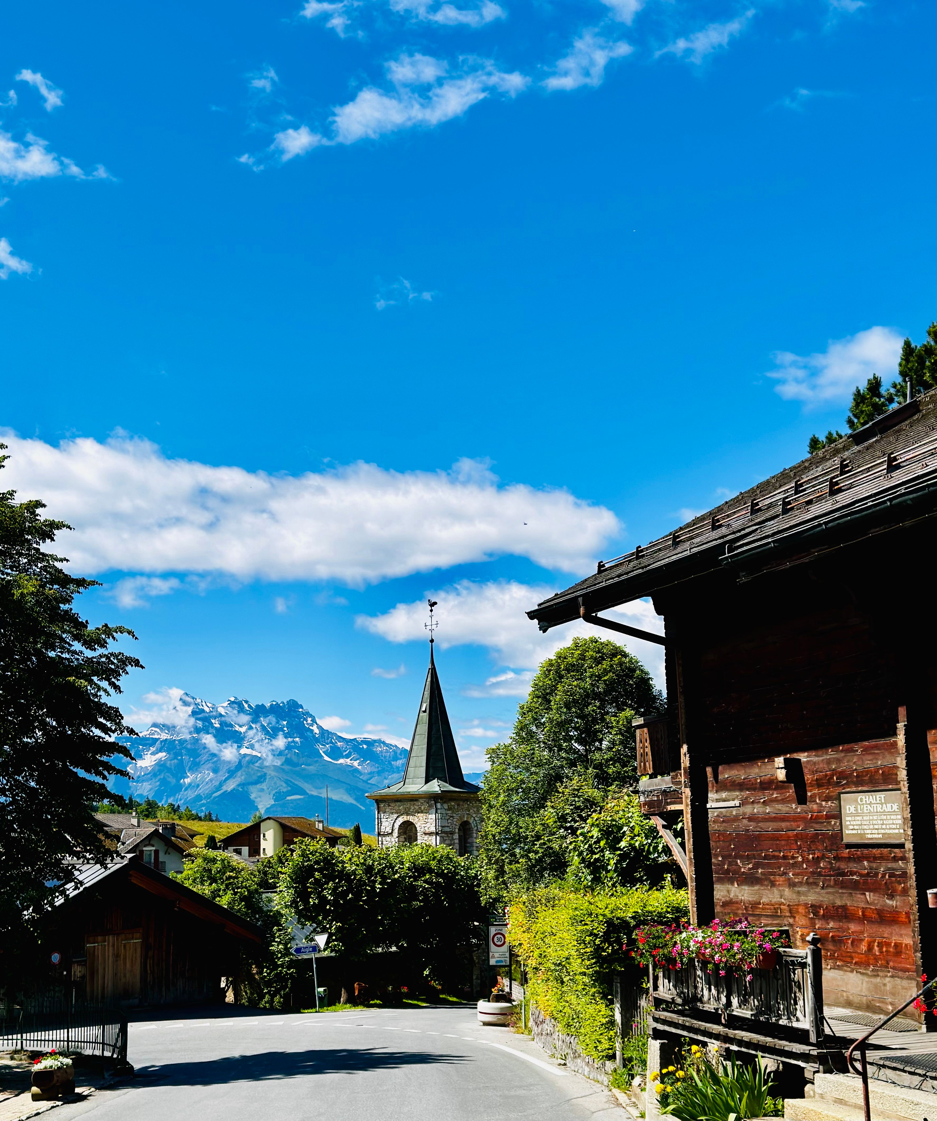 Picturesque view of Leysin village with stunning Alpine mountains in the background.